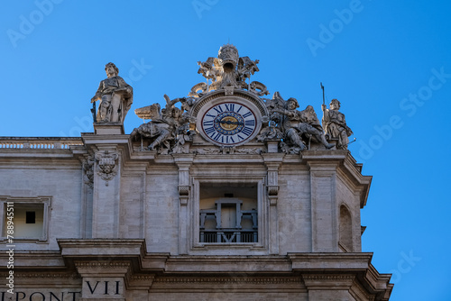 Architectural detail of Saint Peter's Basilica in Vatican City, the papal enclave in Rome, showcasing intricate design elements and structural features.