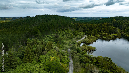 Drone perspective  of Lake Mangamahoe Taranaki  surrounded by forest