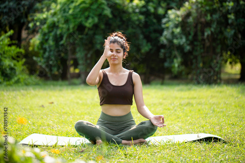 Wallpaper Mural Ravishing Woman Doing Anulom Vilom Pranayama In Park
 Torontodigital.ca