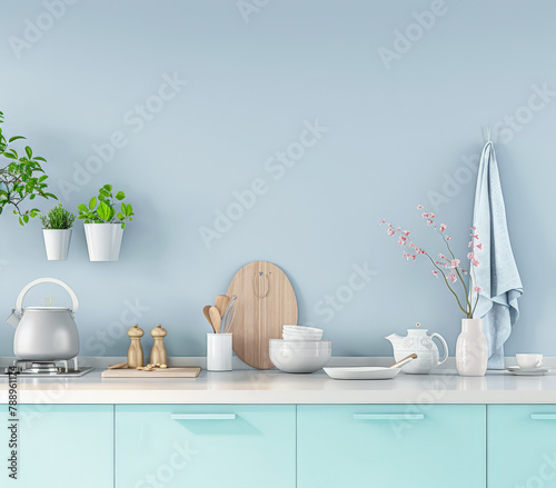 Elegant kitchen interiors in pastel blue tones with a modern minimalist style. Interiors composition.