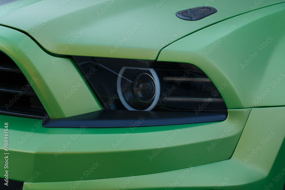 Green car headlight. Green car headlight.