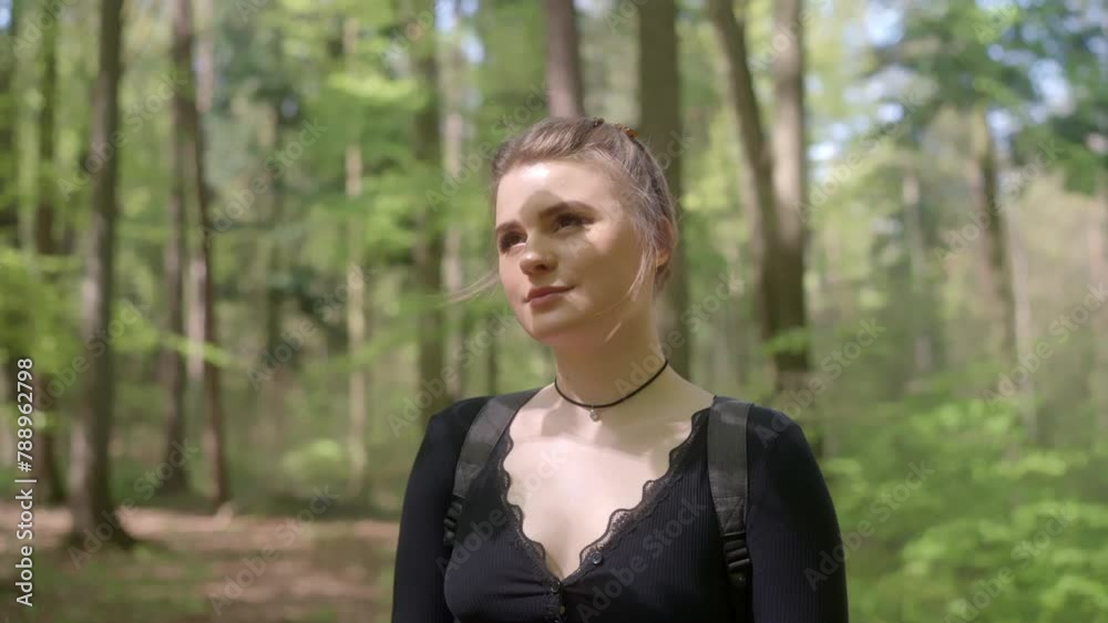 Young woman stands alone surrounded by beauty of Mother Nature, Slow-mo Young woman stands alone surrounded by beauty of Mother Nature, Slow-mo