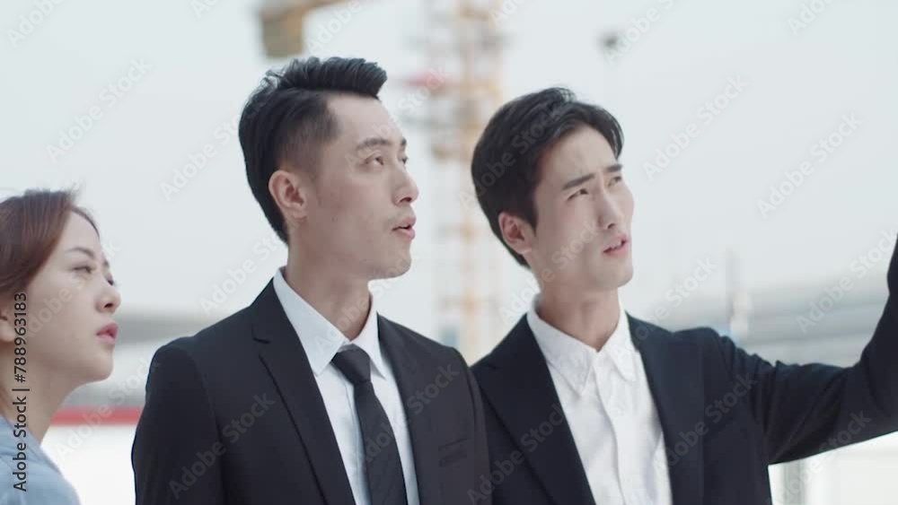 Architect And Inspector Checking Plans At Construction Site. Contractor recheck drawing and solve building structure problems. Architect And Inspector Checking Plans At Construction Site. Contractor recheck drawing and solve building structure problems.