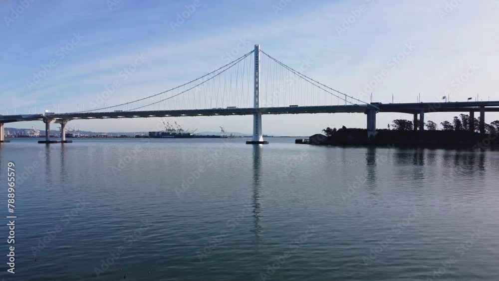 Low Angle Zoom In Drone Shot of the San Francisco Bay Bridge near Treasure Island. Low Angle Zoom In Drone Shot of the San Francisco Bay Bridge near Treasure Island.