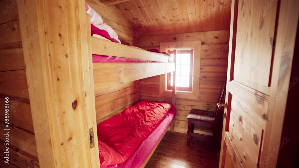 Cabin Bedroom With Bunk Beds In Verran, Norway. handheld shot Cabin Bedroom With Bunk Beds In Verran, Norway. handheld shot