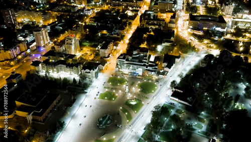 Fototapeta Naklejka Na Ścianę i Meble -  Lipetsk, Russia. Peter the Great Square. Night city lights. Flight after sunset. History Center, Aerial View
