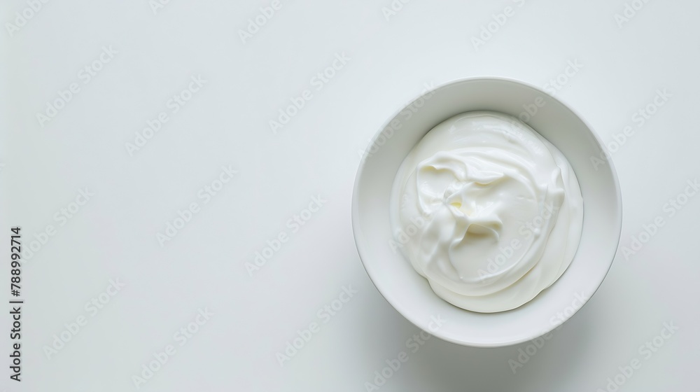 Bowl of white creamy yogurt isolated on white background top view flat lay : Generative AI Bowl of white creamy yogurt isolated on white background top view flat lay : Generative AI