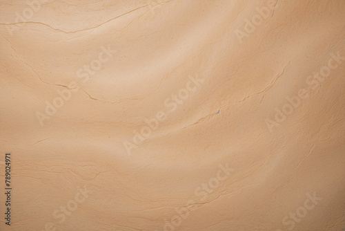 High-resolution image showcasing the rich and elegant texture of beige marble with natural patterns