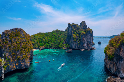 Phi Phi Don island  Nui beach. Thailand Aerial view paradise turquoise lagoon with white coral sand and palms on sunset time