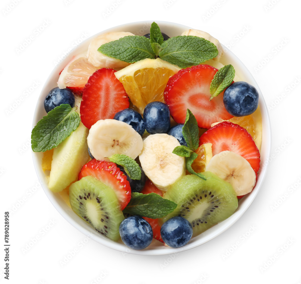 Tasty fruit salad in bowl isolated on white, top view Tasty fruit salad in bowl isolated on white, top view