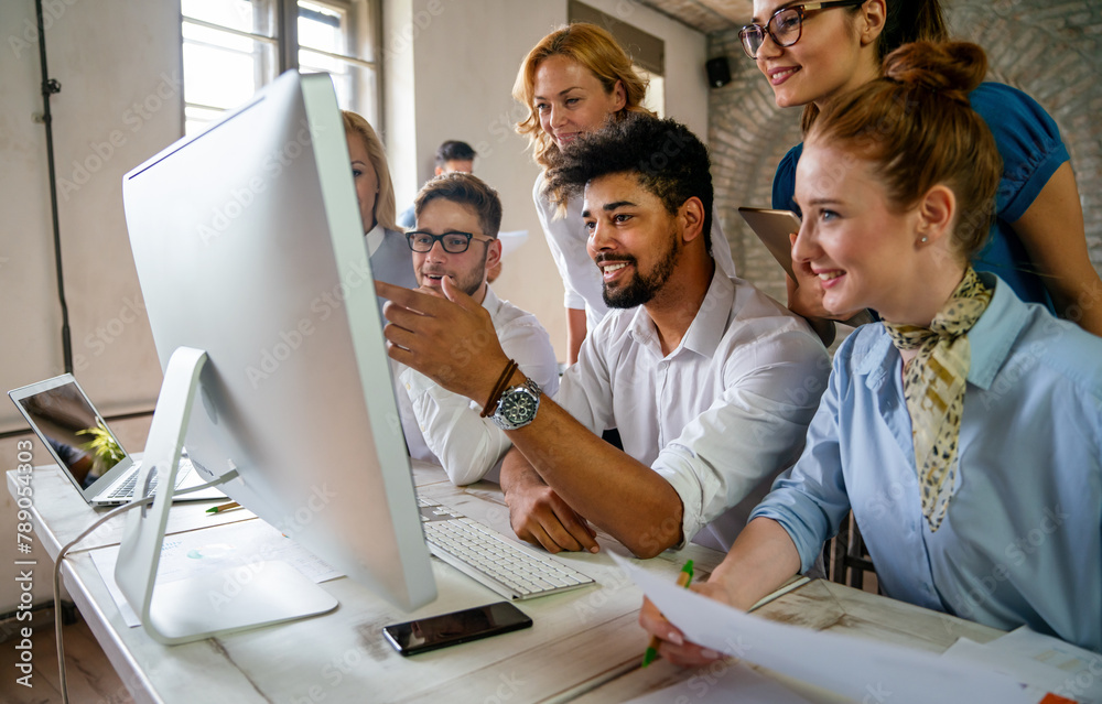 Fototapeta premium Programmers cooperating at IT company developing apps. Business people technology concept