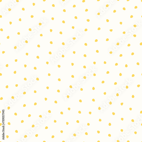 Vector illustration. Seamless pattern of small yellow dots on a light milky white background. Textile printing, fabric design, packaging, wrapping paper, children's wallpaper
