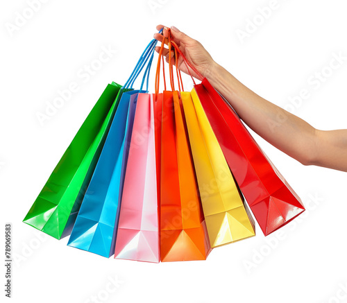 The hand holding the Colorful shopping bags