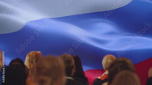 A minute of silence in front of the Russian flag, people in front of the Russian flag photo