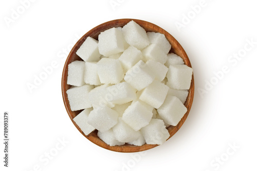 White sugar cubes in wooden bowl on white background © calypso77