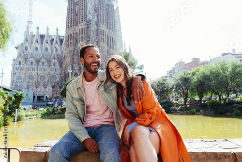 Multiracial beautiful happy couple of lovers dating in Barcelona