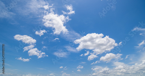 clear blue sky background clouds with background  Blue sky background with tiny clouds. White fluffy clouds in the blue sky. 