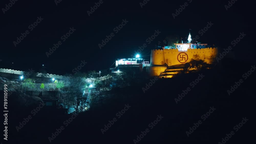 Garh Ganesh Temple, Jaipur, India. 18th-century Temple Of Lord Ganesh. Located On The Aravali Hills Near Nahargarh Fort And Jaigarh Fort. Garh Ganesh Temple In Night Illumination. Travel Destination.