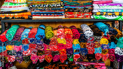 Bali March 2024 - Colorful sarongs on sale in the markets in Bali, Indonesia. © Angelo Calvino