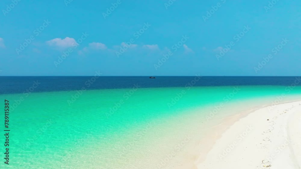 Beach sand background for summer vacation concept. Beach nature and summer seawater with sunlight light sandy beach Sparkling sea water contrast with the blue sky. Beach sand background for summer vacation concept. Beach nature and summer seawater with sunlight light sandy beach Sparkling sea water contrast with the blue sky.
