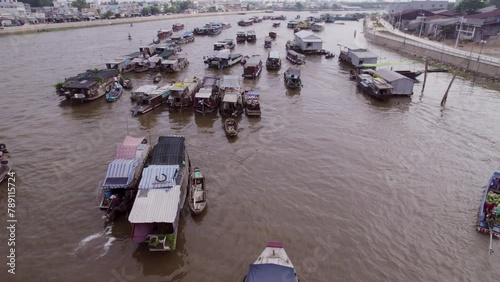 Flight over the Big Cai Rang Floating Market in Asia, Vietnam, Mekong river Delta, Can Tho, in the morning