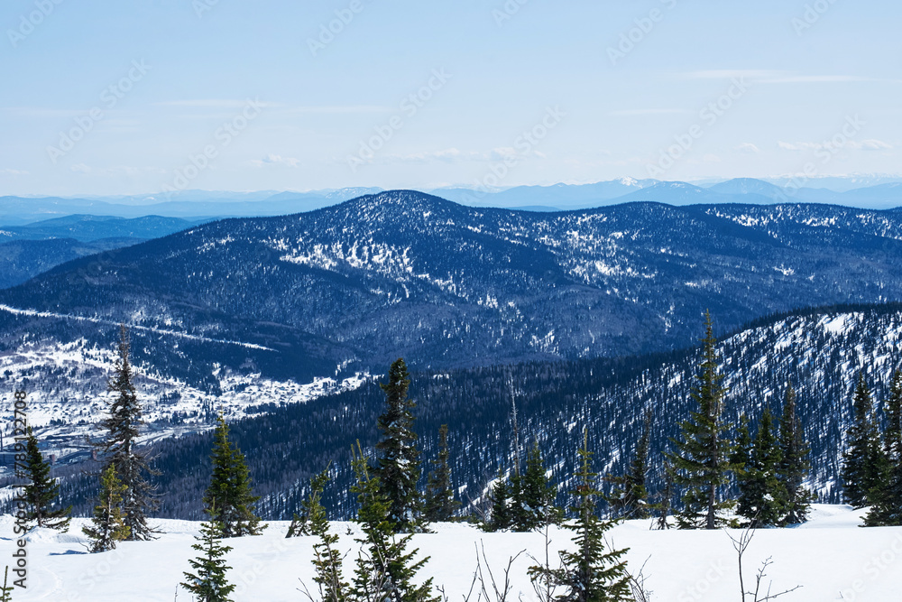 Snow covered wintry mountain landscape.