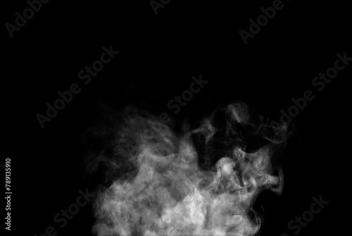 white smoke steam spray isolated on a black background. abstract vapor water concept of texture cold mist or hot vapor, fog effect, and cloud for design air pollution, element smog
