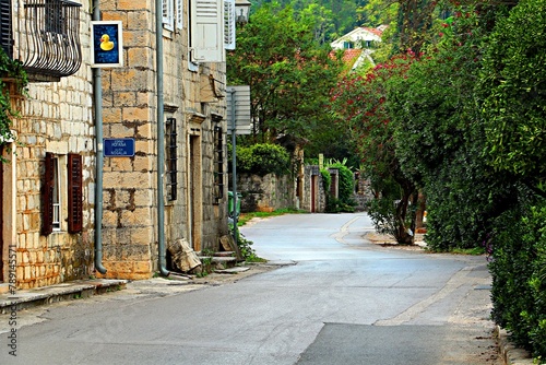 A narrow street in the resort village of Prcanj in Montenegro on the shores of the Bay of Kotor