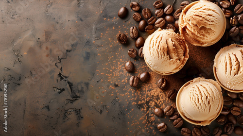 Coffee-flavored ice cream scoops among scattered coffee beans on a dark surface