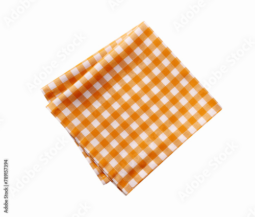 Folded checked yellow tablecloth isolated on white.Picnic orange cloth,dish towel,food decor.