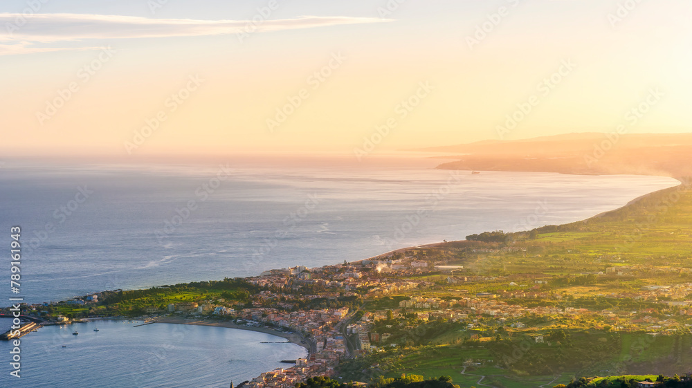 picturesque view to a sunset sea gulf with beautiful mountains and amazing cloudy sky on background of nice travel landscape