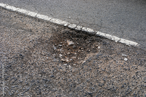 A pothole in a road in Weston-super-Mare, UK on 18 April 2024, part of a widespread problem throughout the UK photo