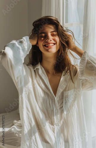 Woman Smiling and Holding Hair