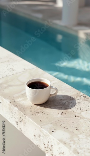 Cup of Coffee Next to Pool Ledge