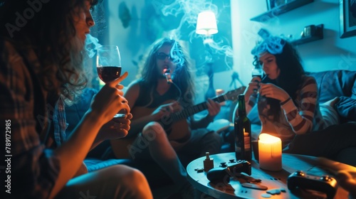 A group of young people smoke cannabis together with smoke in a indoor party photo