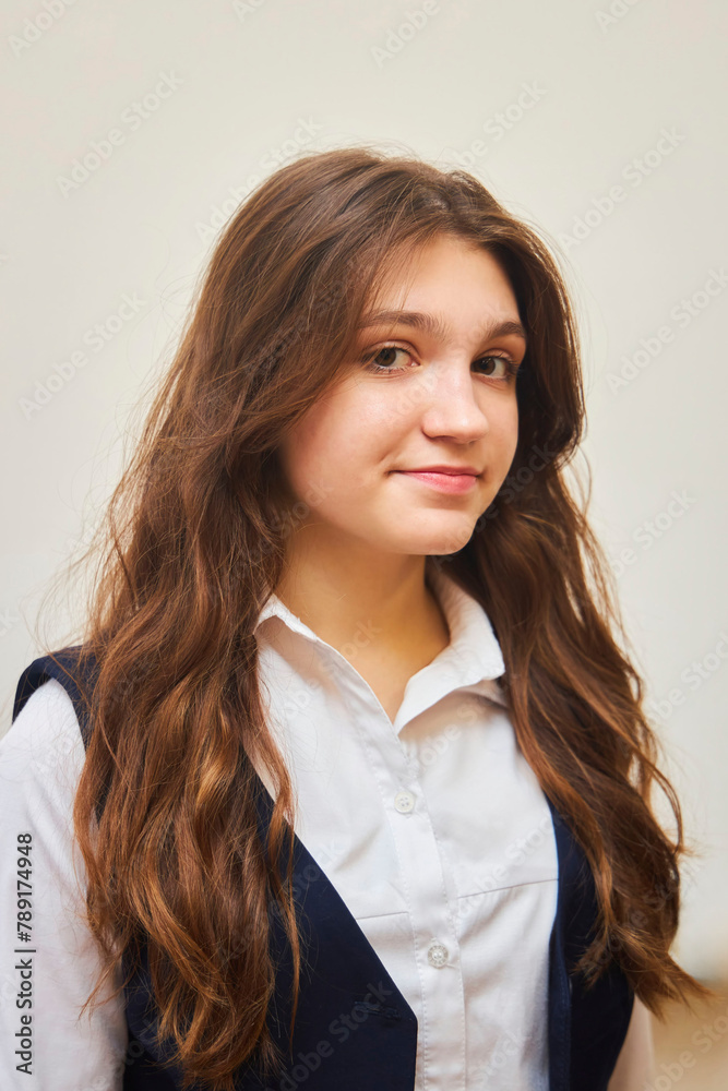 A high school student in uniform on a white background. A high school student in uniform on a white background.