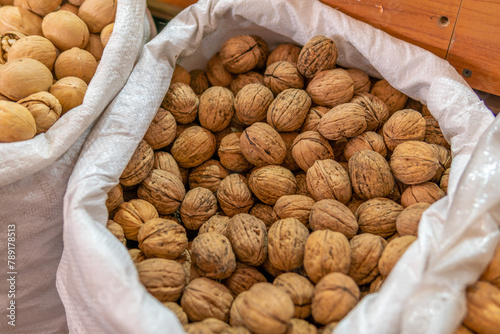 walnuts in a bag are sold at the market © potas
