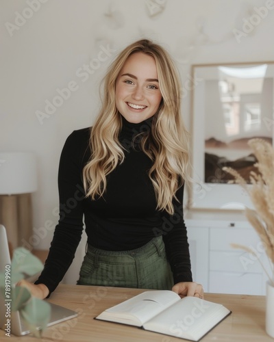 Woman Sitting at Table With Book
