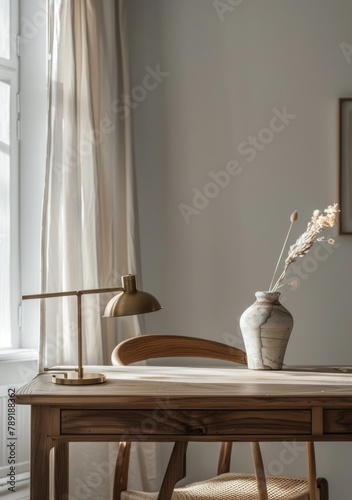 Table With Chair and Vase of Flowers