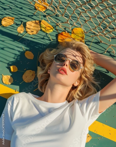 Woman Laying in Hammock Surrounded by Leaves