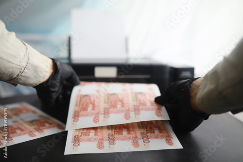 The concept of the global economic crisis. Illegal production of money, the inscription on the bill 