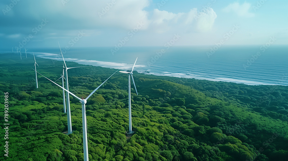 A wind farm is shown in the distance from the ocean. The wind farm is made up of several wind turbines, which are tall and spread out across the landscape. Concept of energy and sustainability