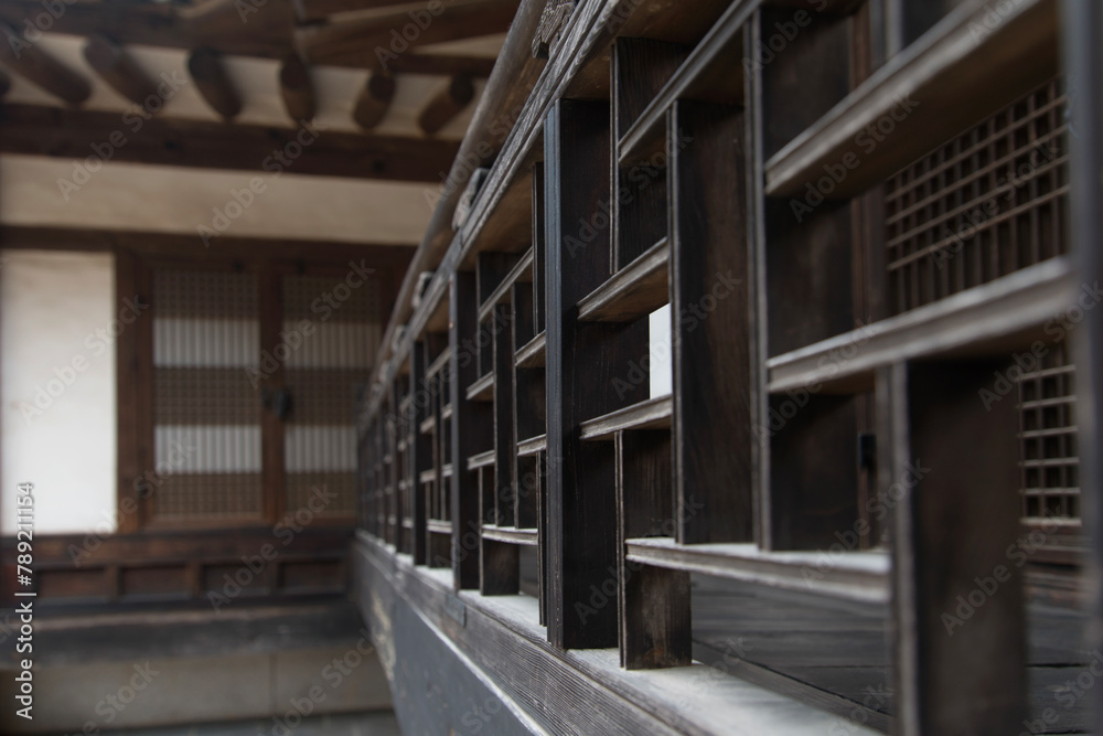 The wooden guardrail in the traditional Korean building