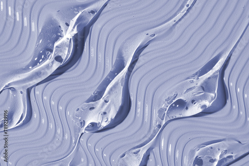 Abstract purple gel texture with smooth waves and droplets