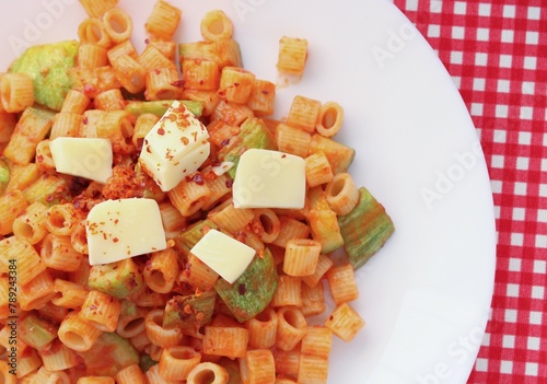 Cooked pasta with cheese and vegetables 