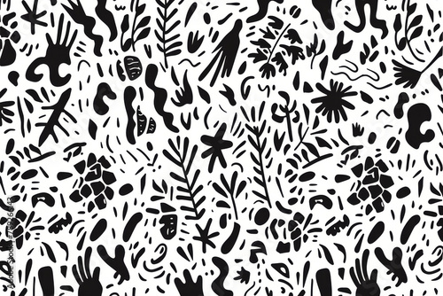 An artistic black and white pattern featuring tropical shapes and forms which give an exotic and wild touch to the design photo