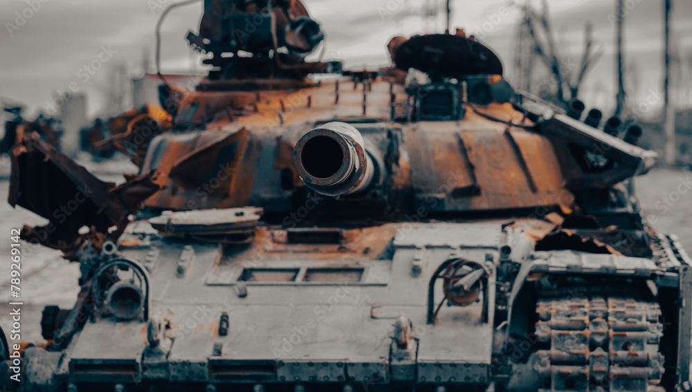 damaged military tank on a city street in Ukraine damaged military tank on a city street in Ukraine