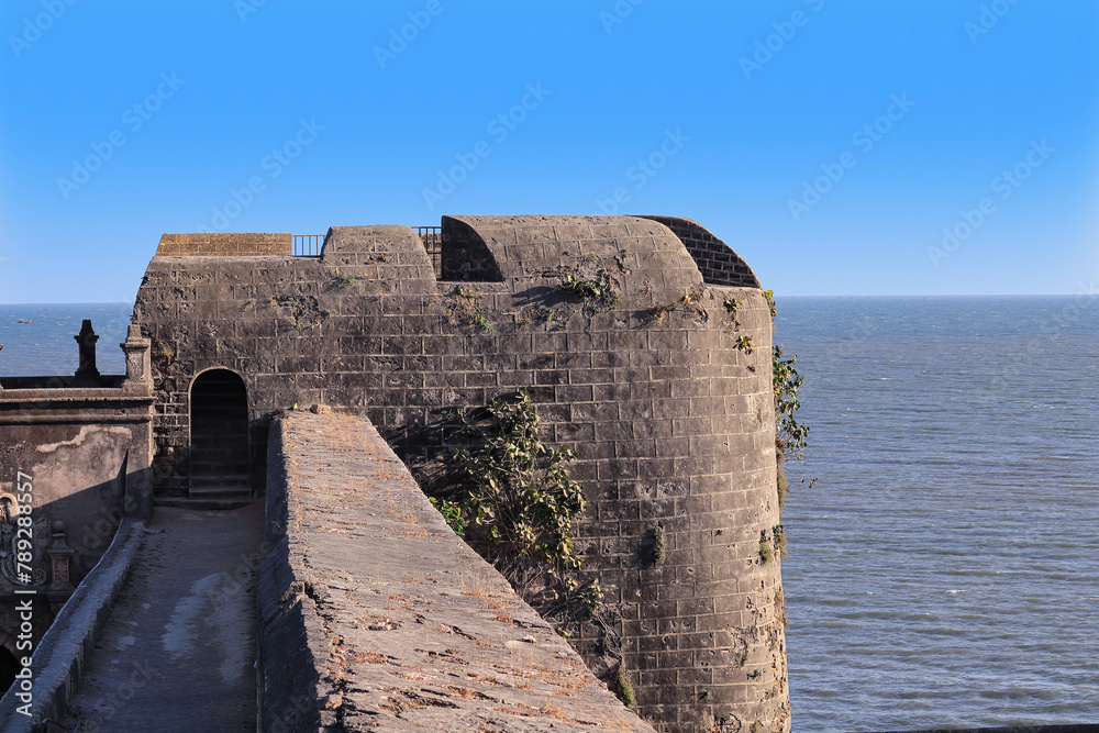 The images of Diu fort built in 16th century by Portuguese at the eastern. The old lighthouse on the famous tourist spot of fort diu. built by Portuguese, located in Daman and Diu, India The images of Diu fort built in 16th century by Portuguese at the eastern. The old lighthouse on the famous tourist spot of fort diu. built by Portuguese, located in Daman and Diu, India