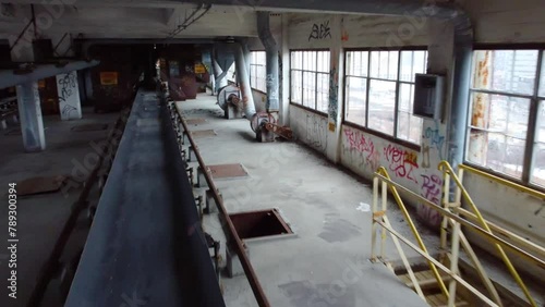 Wallpaper Mural Inside abandoned factory with conveyor belt building full of graffiti Montreal Canada Torontodigital.ca