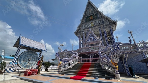 February 20 2024, Chathaburi,Thailand : Beautiful architecture of blue temple built from ceramic at Pak Nam Khaem Nu temple Chathaburi,Thailand.